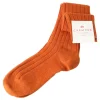 Calcetines largos sport en color naranja.